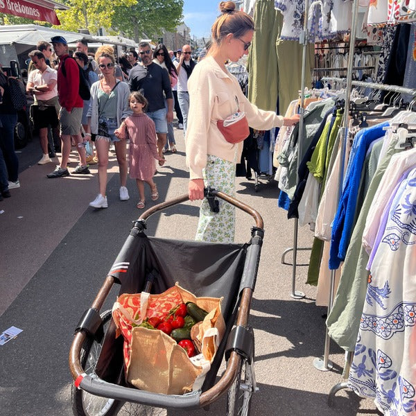 Béquille pour transporter la maïna au quotidien