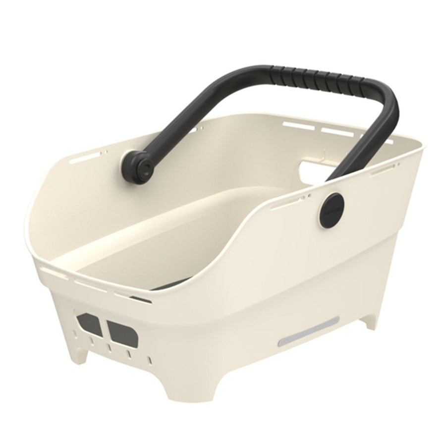 Panier Basil Cento Neo ivoire avec poignée noire ergonomique, parfait pour transporter vos affaires en vélo urbain
