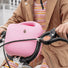 Panier velo enfant woom pop rose pale sur guidon, leger et pratique pour transporter affaires lors des balades