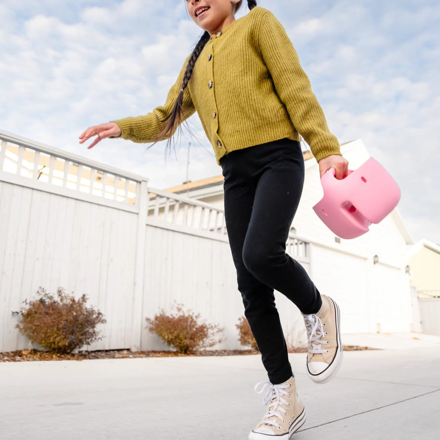 Panier vélo enfant Woom POP rose pastel léger et pratique pour transporter affaires lors des balades à vélo
