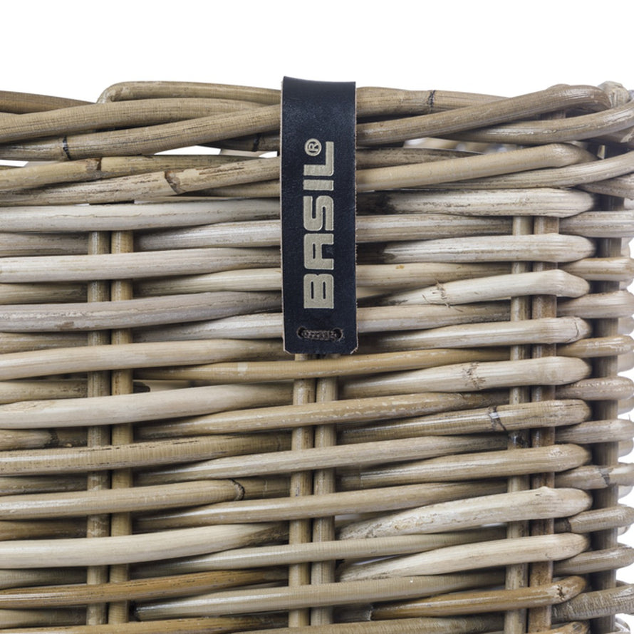 Panier vélo avant en rotin tressé main Basil Dax, design naturel et fonctionnel pour vos trajets quotidiens