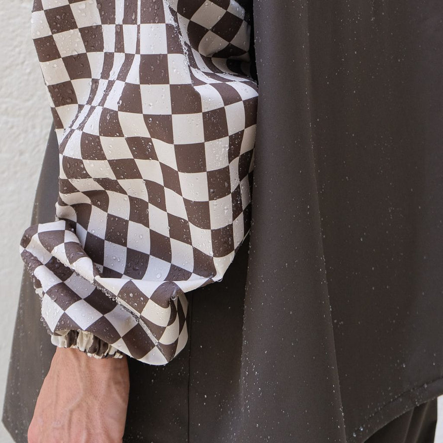 Poncho de pluie court Poule Party adulte  Damier Kaki vélo deperlant recyclé urbain ville pratique capuche style