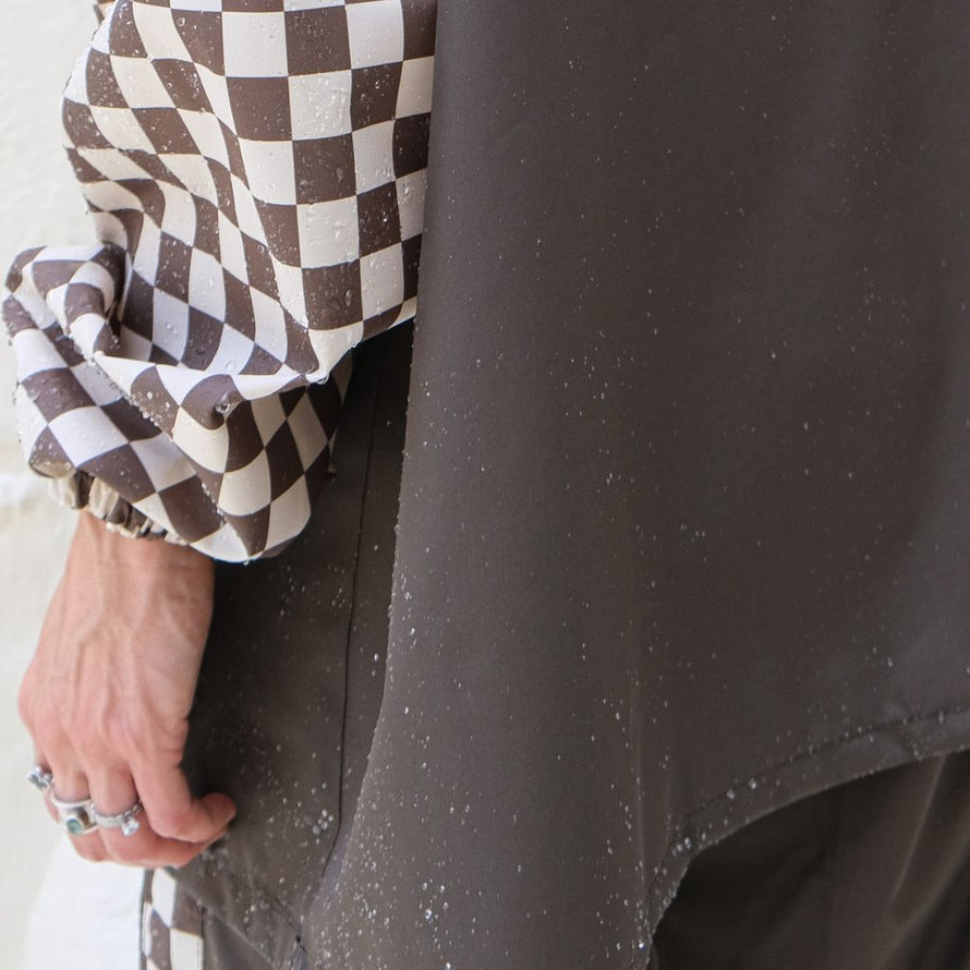 Poncho de pluie court Poule Party adulte  Damier Kaki vélo deperlant recyclé urbain ville pratique capuche  écoresponsable