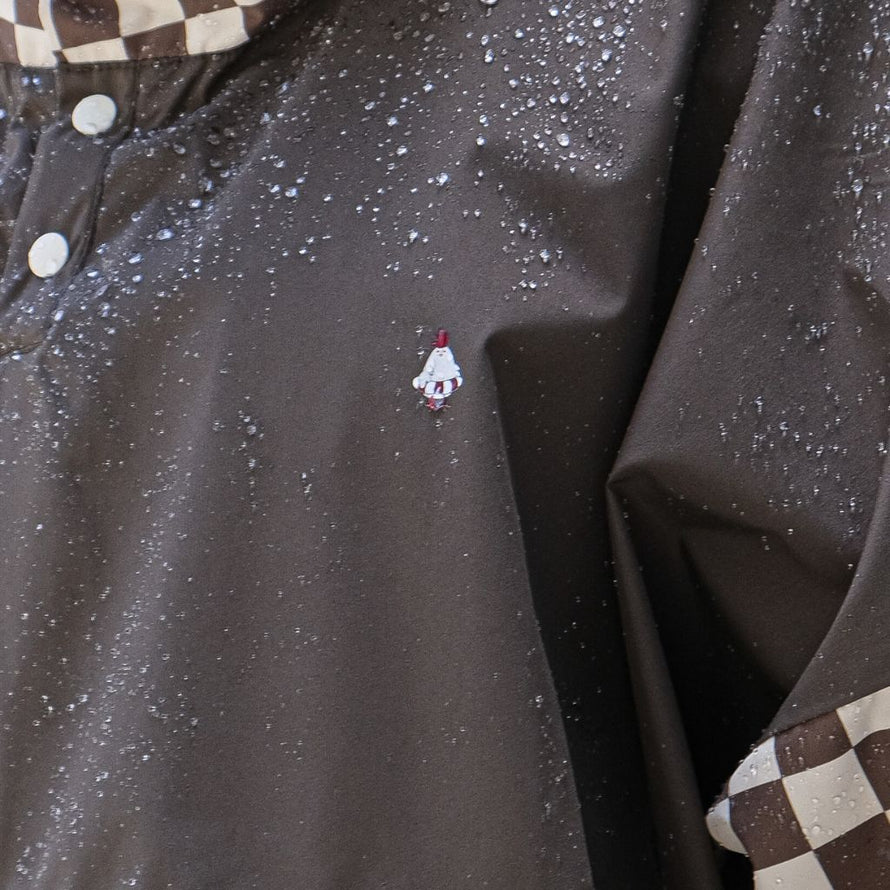 Poncho de pluie court Poule Party adulte  Damier Kaki vélo deperlant recyclé urbain ville pratique style original écoresponsable