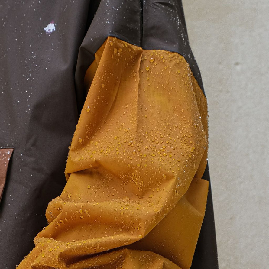 Poncho de pluie court Poule Party adulte Kaki vélo deperlant recyclé urbain pratique capuche style original écoresponsable