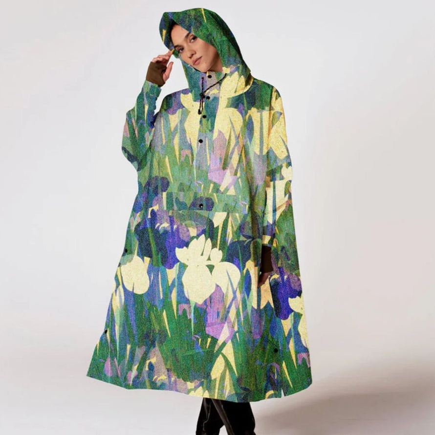 Poncho de pluie vélo recyclé Rainkiss modèle Iris Floral, imperméable et écologique pour cyclistes urbains stylés