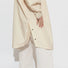 Poncho de pluie vélo Vivi Mari imperméable beige, coupe moderne et protection efficace pour cyclistes urbains