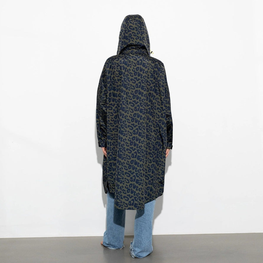 Poncho de pluie vélo Vivi Mari imperméable motif léopard bleu avec capuche, idéal pour cyclistes urbaines