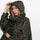 Poncho de pluie vélo Vivi Mari imperméable motif taches kaki et noir pour cyclistes urbains élégants