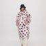 Poncho de pluie vélo Vivi Mari imperméable à gros pois bleus sur fond rose pour femme cycliste urbaine moderne