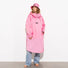 Poncho de pluie vélo Vivi Mari imperméable rose avec capuche, idéal pour femme cycliste urbaine moderne