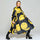 Vue dynamique du poncho de pluie Rainkiss All Smiles, design iconique aux grands sourires jaunes, symbole de fun et d’énergie même sous la pluie.