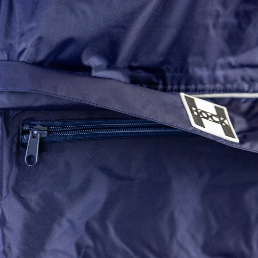 Détail de la fermeture éclair sur poncho vélo imperméable adulte Hock Rain Stop bleu