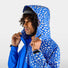 Poncho vélo zippé réfléchissant Urban Circus Francigena bleu motifs clairs pour cyclistes urbains, protection pluie et visibilité optimale