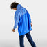 Poncho vélo zippé réfléchissant Urban Circus Francigena bleu motifs urbains pour cyclistes recherchant confort et sécurité
