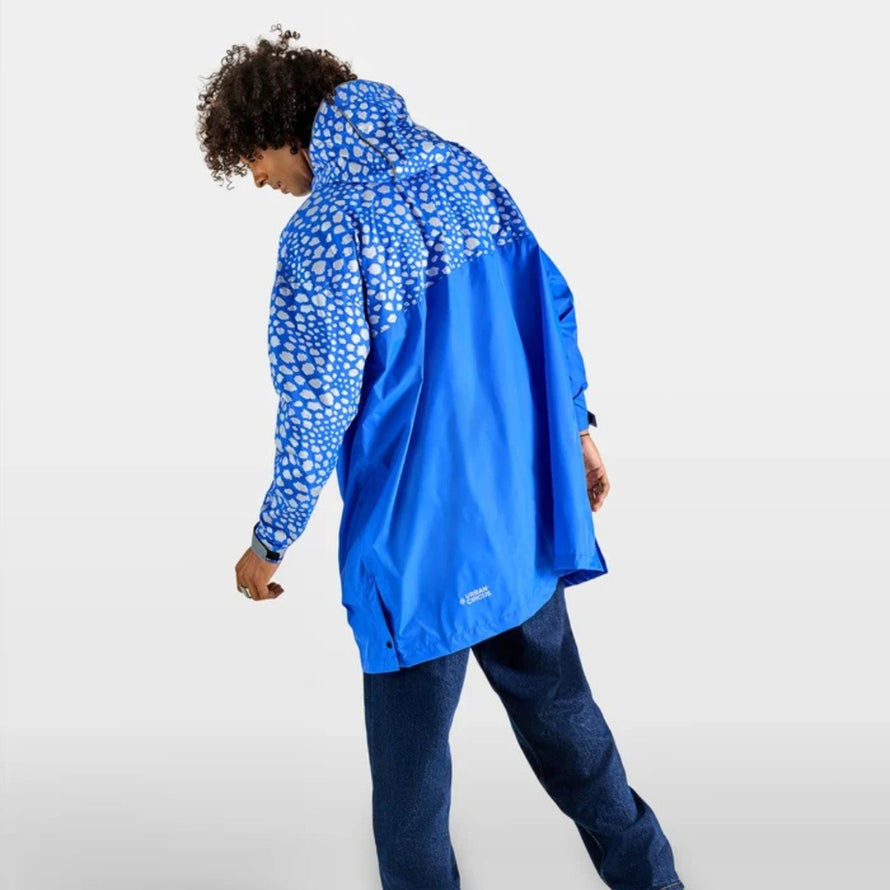 Poncho vélo zippé réfléchissant Urban Circus Francigena bleu motifs urbains pour cyclistes recherchant confort et sécurité