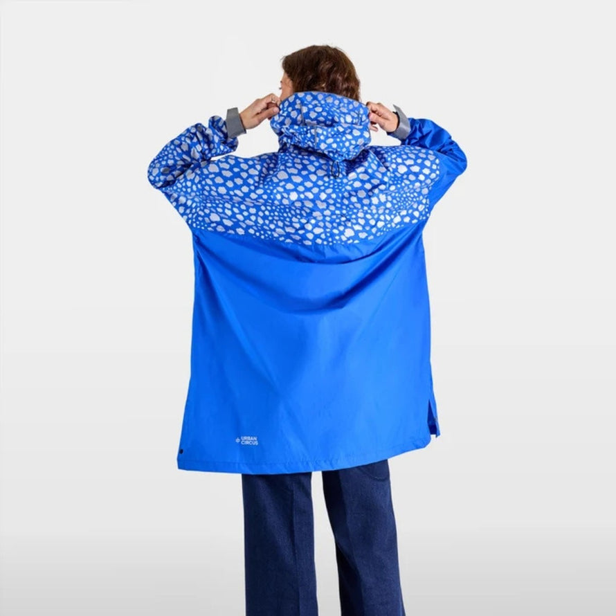 Poncho vélo zippé réfléchissant Urban Circus Francigena bleu à motifs points pour cyclistes urbains sécurité et pluie