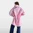 Poncho velo zippe reflechissant Urban Circus Francigena rose avec motif pour cyclistes urbains protegeant de la pluie