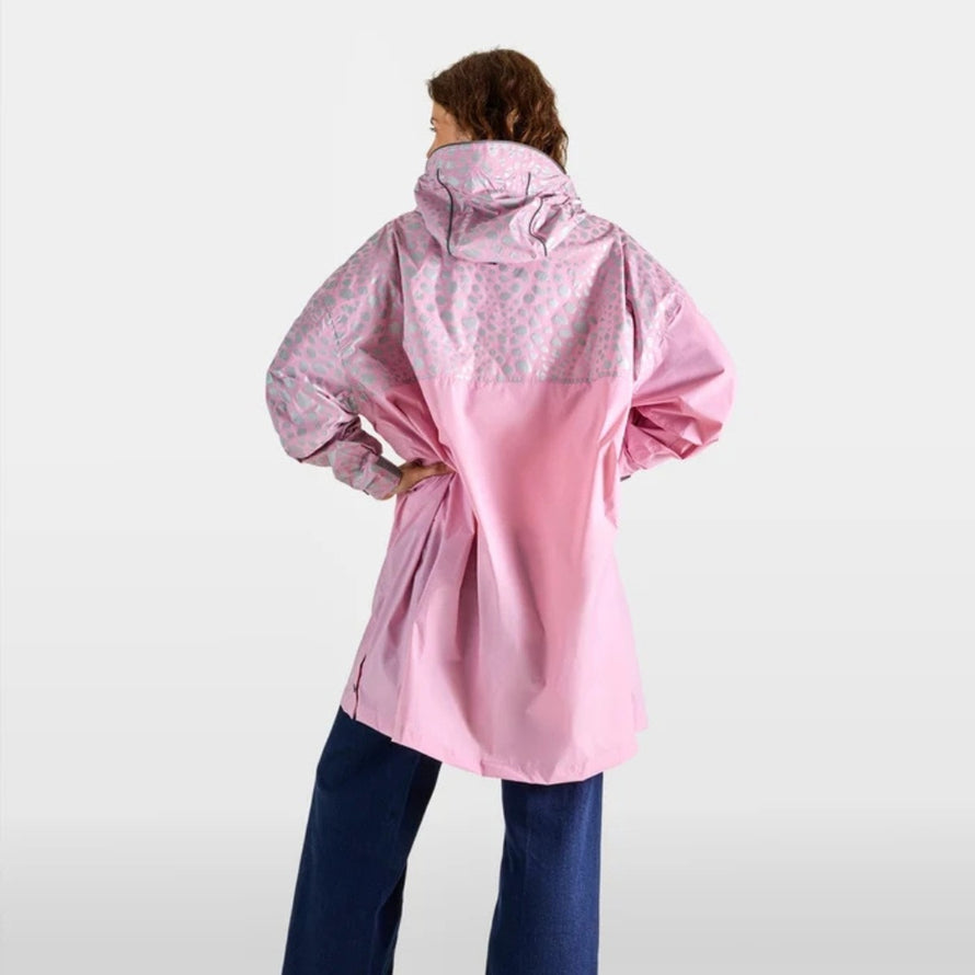 Poncho velo zippe reflechissant Urban Circus Francigena rose avec motif pour cyclistes urbains protegeant de la pluie