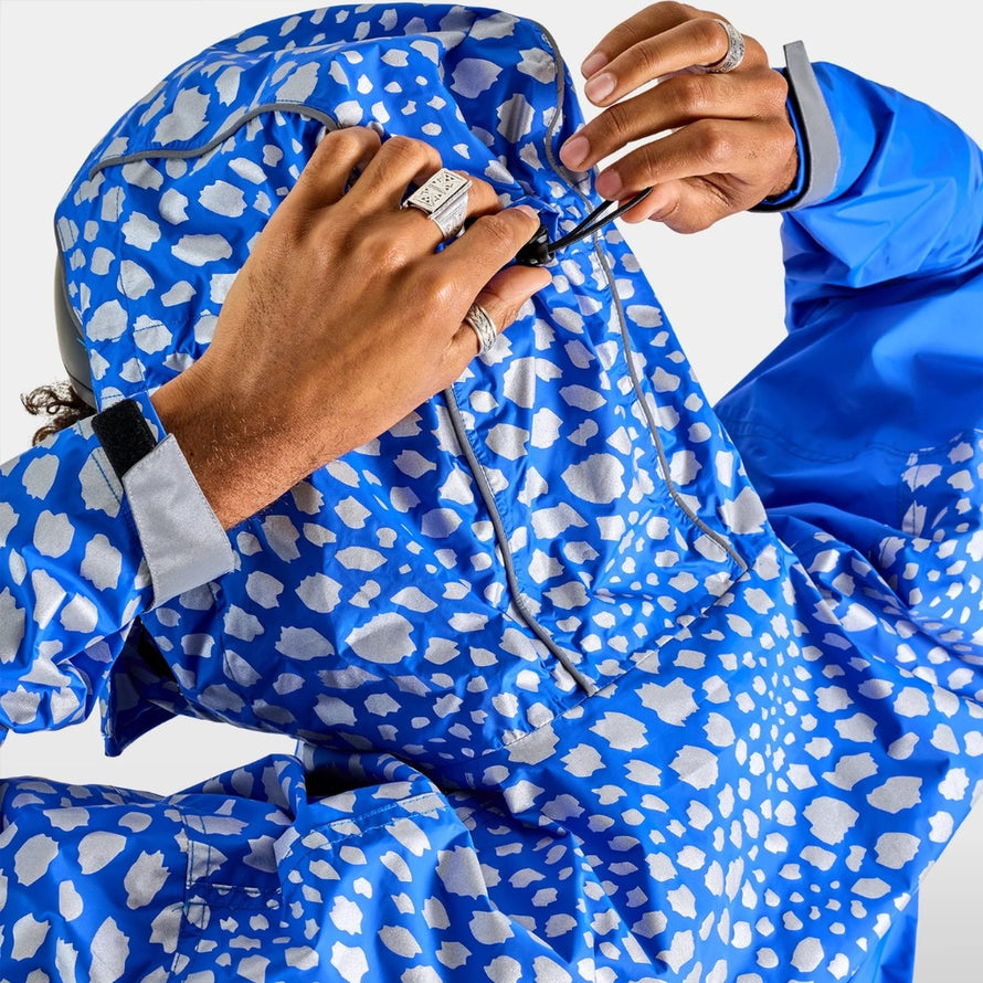 Poncho vélo zippé réfléchissant Urban Circus Francigena bleu pour sécurité et confort à vélo