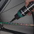 Lubrifiant Wat Lube premium pour conditions humides appliqué sur une chaine