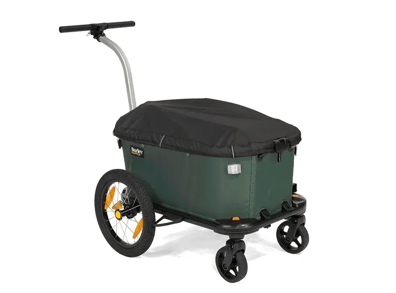 La remorque-chariot Hopper de Burley permet de transporter ses affaires à vélo et à pied, avec une bâche imperméable
