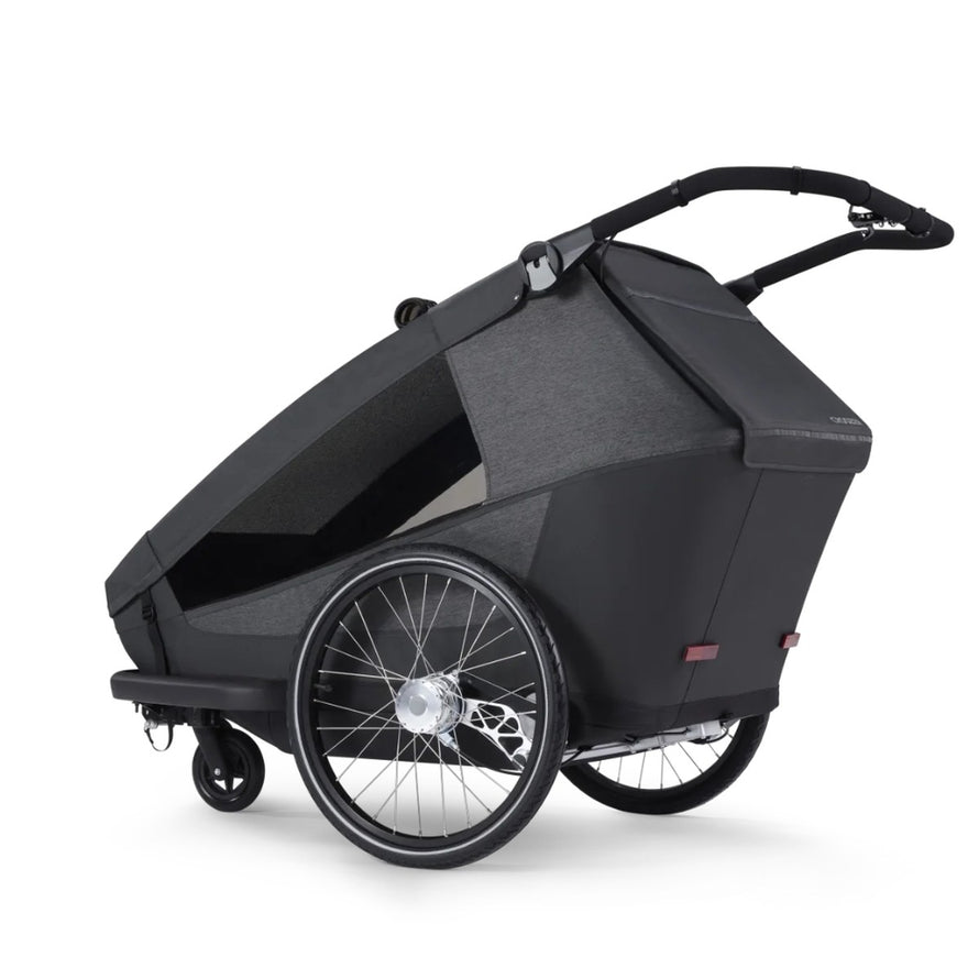 Remorque velo modulaire Yuuna Croozer vue profil arriere avec structure robuste et design moderne