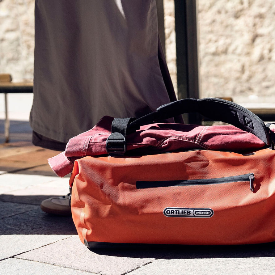 Sac à dos vélo Ortlieb Duffle Lite orange, compact et étanche pour voyages urbains et outdoor