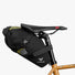 Sacoche de selle bikepacking Apidura Racing noire et jaune, idéale pour voyages et aventures à vélo