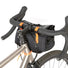 Sacoche vélo ReStrap Utility Hip Pack noire avec fixation guidon et sangles orange, convertible en sac banane pratique