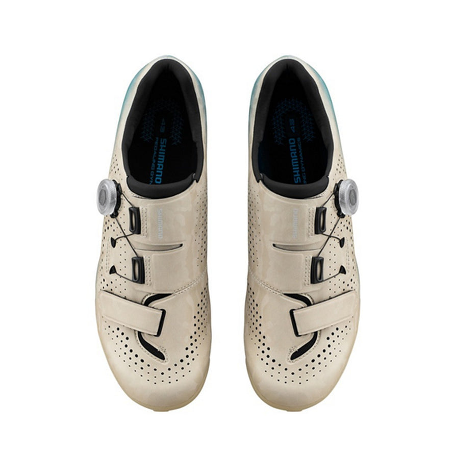 Chaussures gravel homme Shimano SH-RX600 SPD beige avec fermeture micrométrique pour confort et performance cyclisme