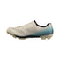 Chaussures gravel homme Shimano SH-RX600 SPD beige et bleu, alliant confort et performance pour cyclisme tout-terrain