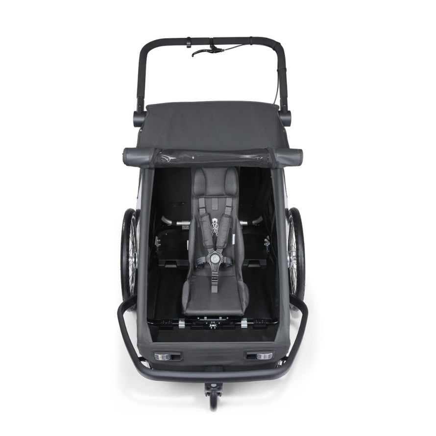 Siege enfant Yuuna Croozer pour remorque velo avec harnais ergonomique et confort pour longues balades
