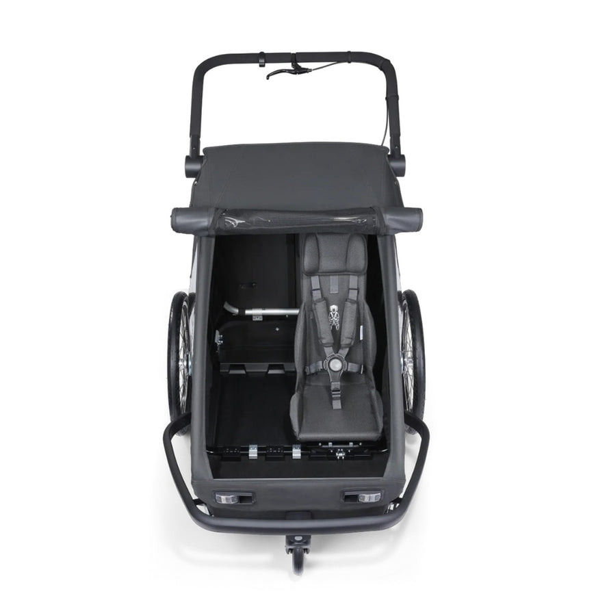 Siege enfant Yuuna Croozer pour remorque velo avec harnais ajustable et confort optimal pour balades en famille