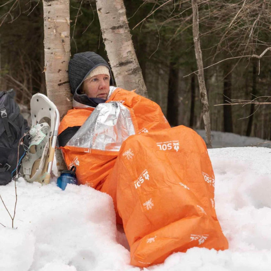 Sac de couchage Bivvy Escape Light SOL orange pour bivouac d'urgence et isolation thermique en conditions froides