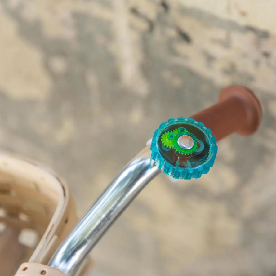 Sonnette vélo transparente avec mécanisme visible Rainette