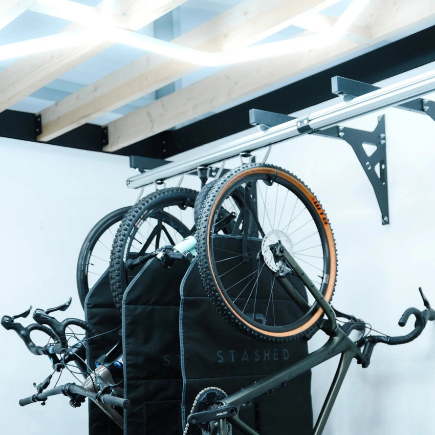 Tapis de protection Stashed Launch Pad pour vélo suspendu, protège cadre et roues avec robustesse et style