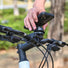 Support smartphone guidon Outplorer QB01 fixé sur un vélo pour une navigation facile en roulant