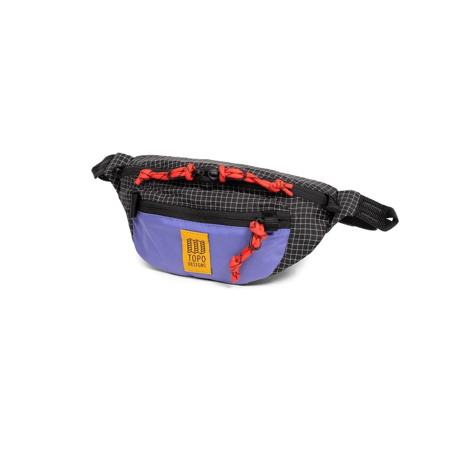 Sacoche banane Topo Designs Mountain Waist Pack 1L noire violet avec details rouges, pratique pour velo et randonnées