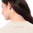 T-shirt Dames Vaude Redmont Heavyweight beige met roze logo op de rug, ideaal voor comfortabele fietstochten
