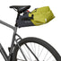 Sacoche de selle Trailsaddle Vaude vert anis et noir, étanche et robuste pour cyclisme aventure