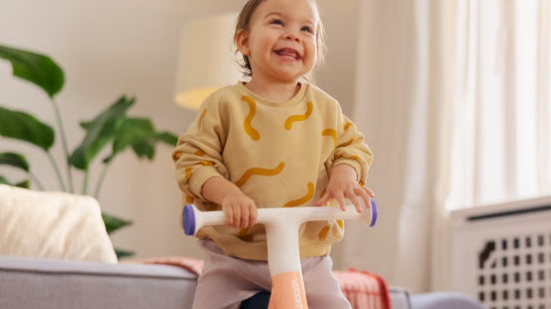 enfant sur draisienne