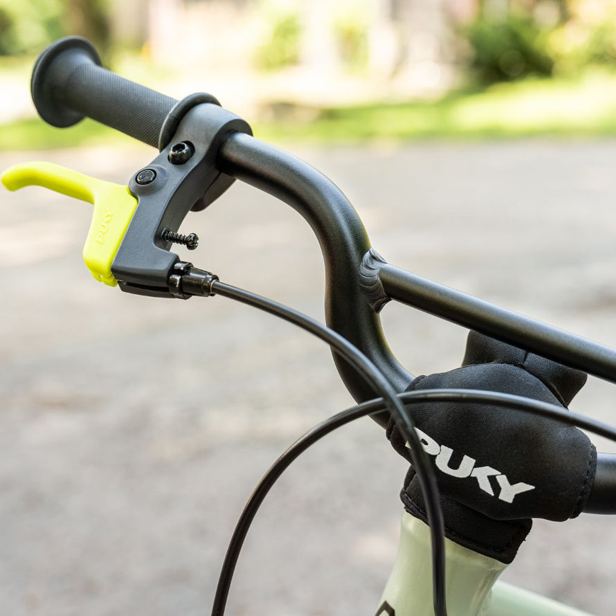 Guidon du vélo enfant PUKY LS-PRO 14 avec poignées ergonomiques, cloche et leviers de frein différenciés par couleur
