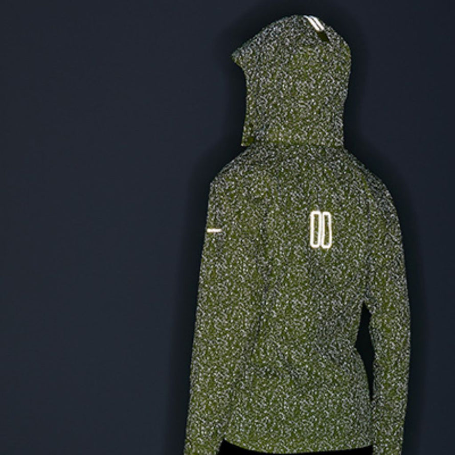 Veste de pluie jaune avec imprimés et bandes réfléchissantes pour la sécurité à vélo