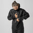 Veste imperméable vélo femme Explr GripGrab noire avec capuche, protection efficace contre la pluie