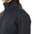 Zoom sur veste polaire femme Vaude Skomer SC noire avec texture hexagonale pour randonnée