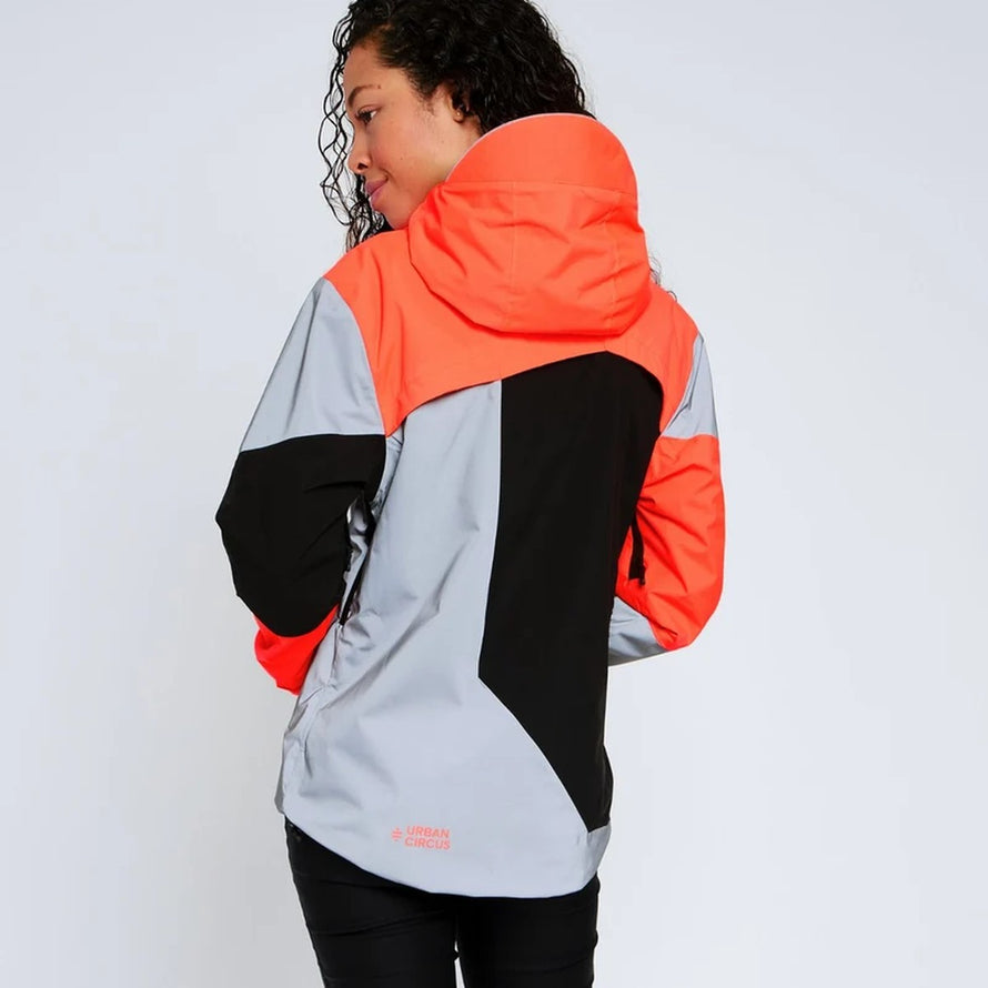 Veste de vélo réversible et réfléchissante Repop Urban Circus en orange et noir pour cyclistes urbains sécurisés