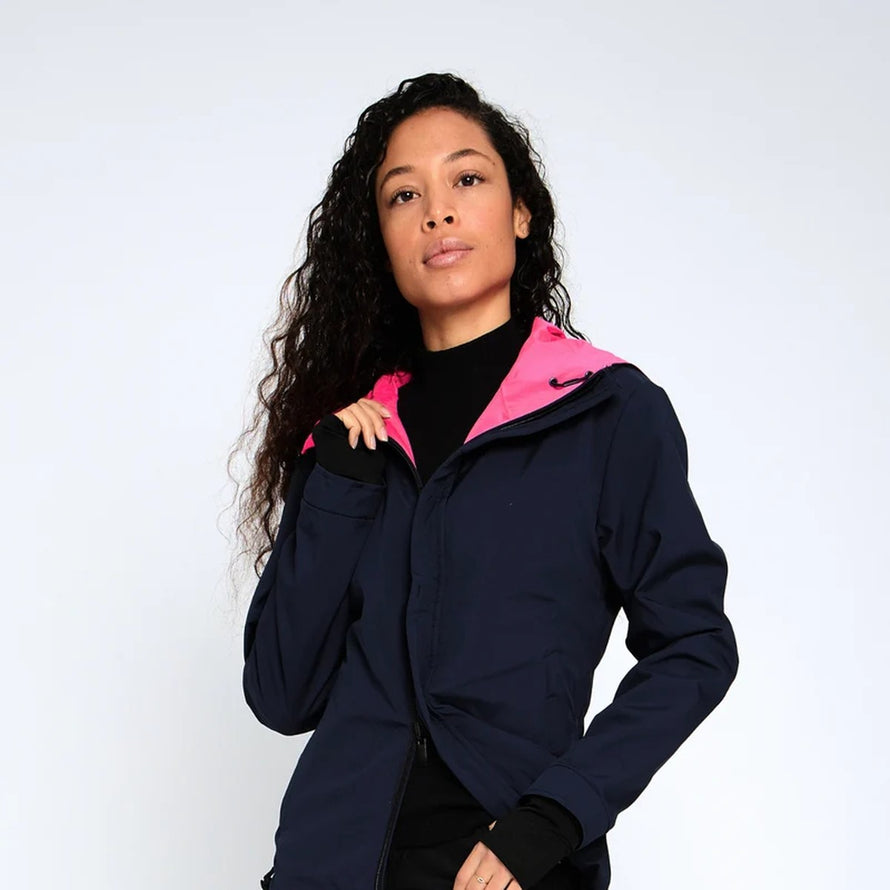 Veste de vélo réversible Urban Circus Repop femme en bleu marine et rose, alliant style et sécurité urbaine