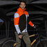 Homme en veste Urban Circus Repop orange noir réfléchissante pour vélo urbain, sécurité optimale de nuit