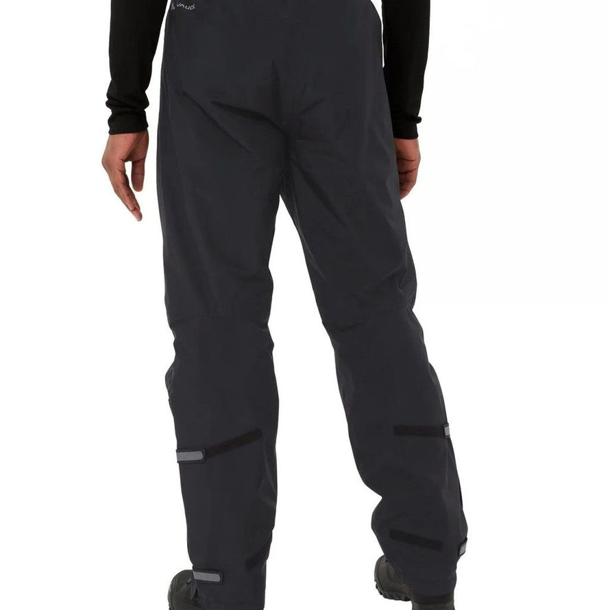 vue arriere du pantalon de pluie vaude escape montrant la coupe ample et les reglages pratiques pour la pratique du velotaf